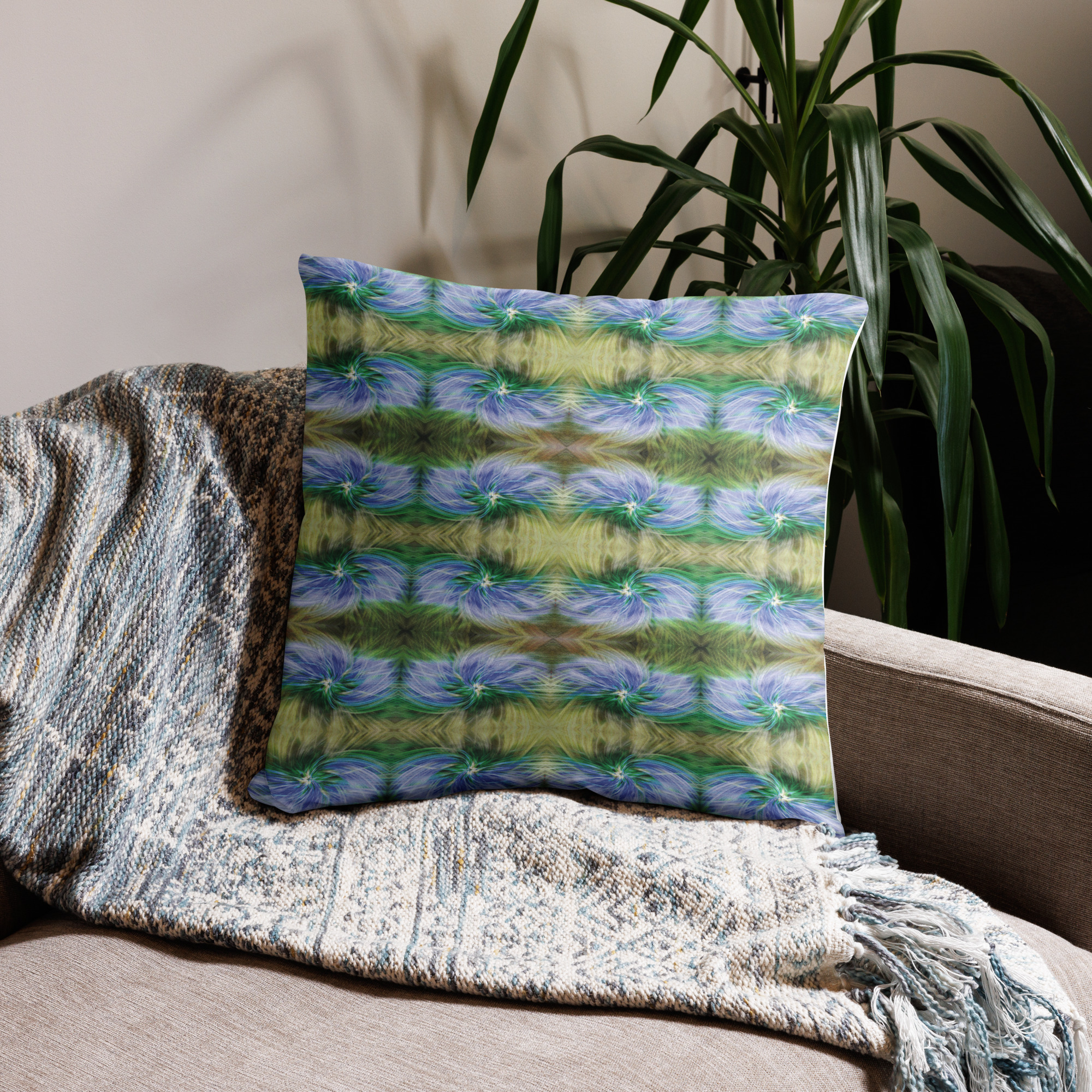cushion with watercolor stripe design featuring horizontal bands in sky blue and green tones creating flowing pattern