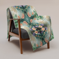 Decorative pattern showing symmetrical mandala design with intricate floral and geometric motifs in soft green, coral and cream tones