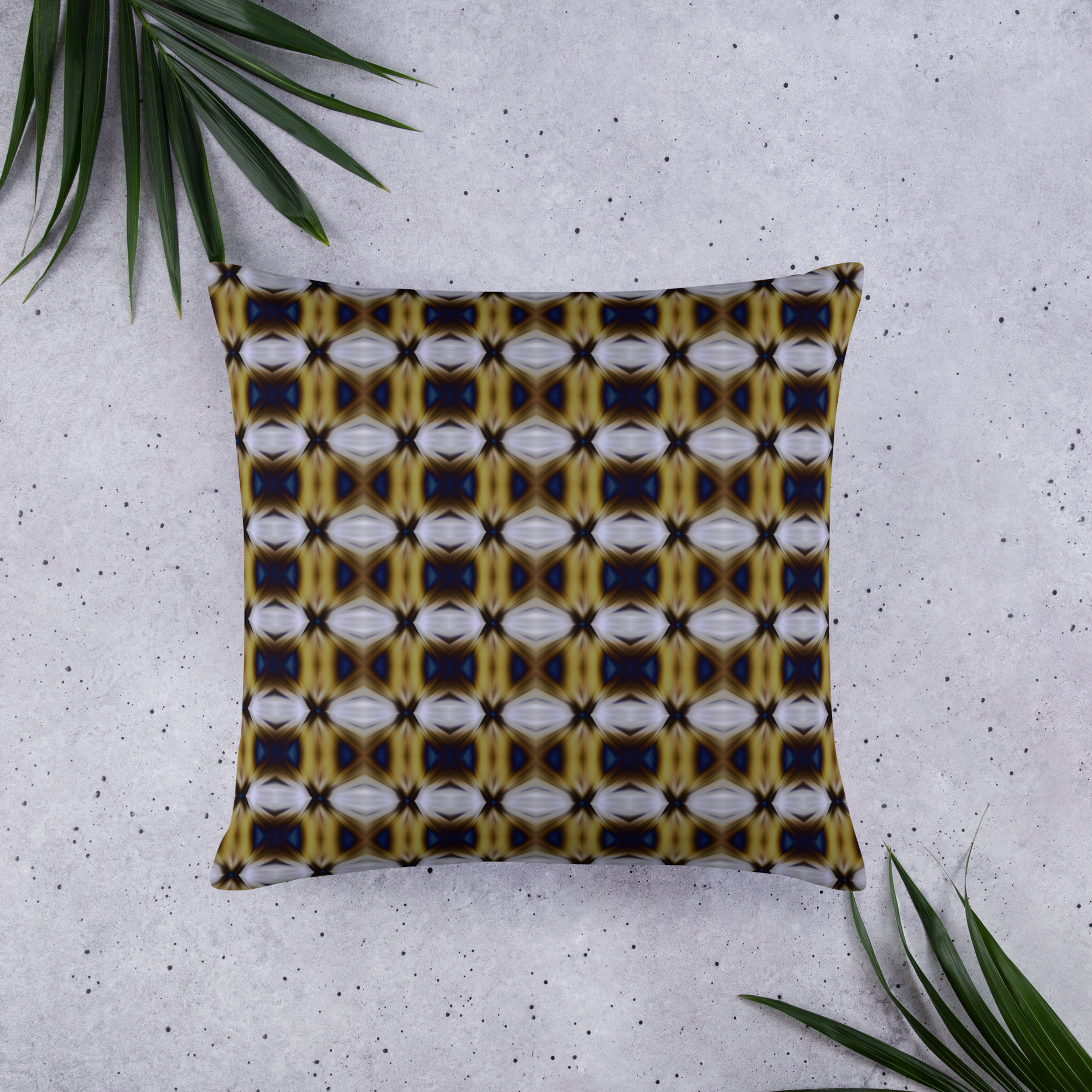 decorative cushion with abstract geometric pattern featuring interlocking curved and angular shapes in gold, navy blue, and cream colors