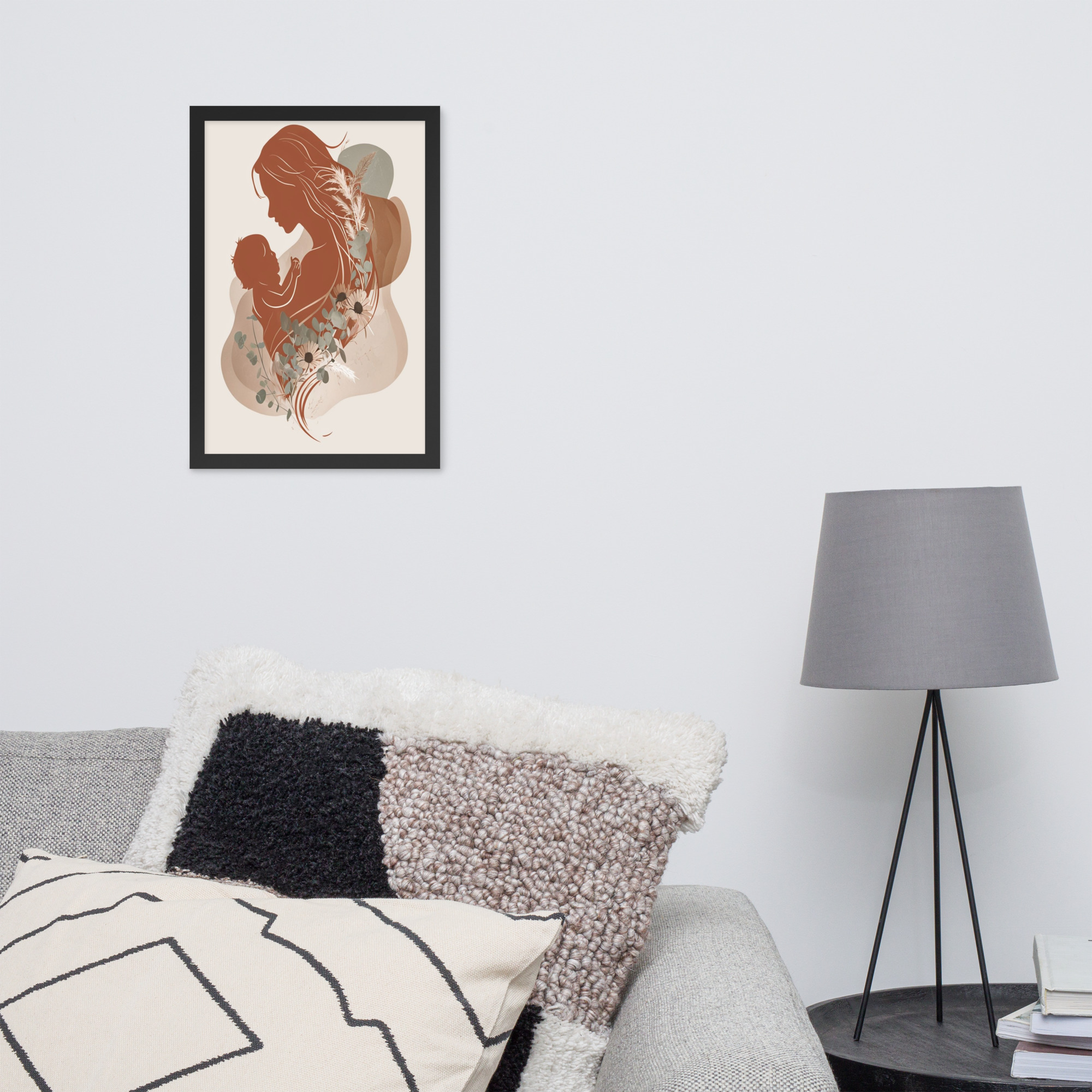Abstract illustration of a woman holding a child, symbolizing a mother's love, framed in a minimalist living room.