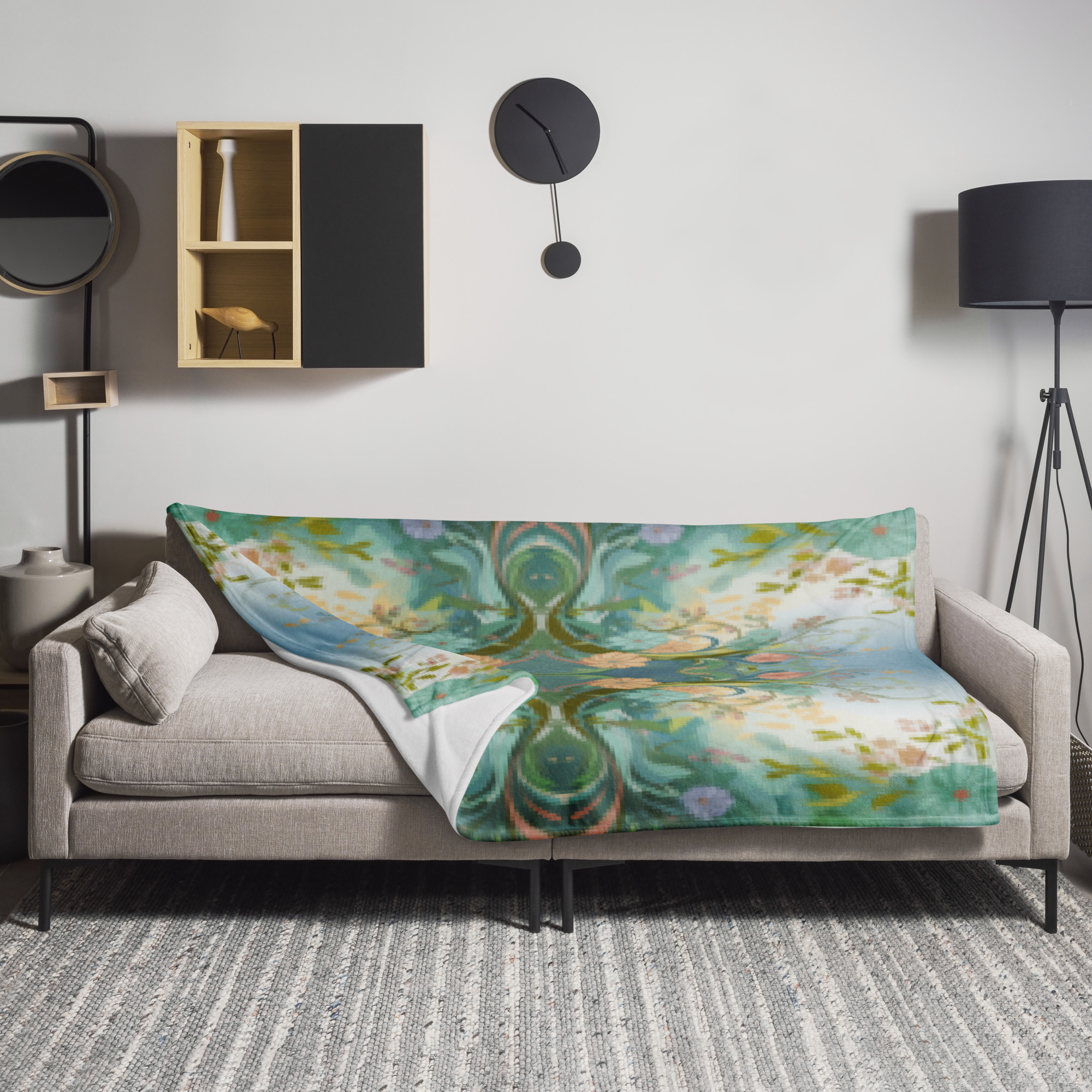 Floral throw blanket with abstract floral art design in soft blue and cream colors